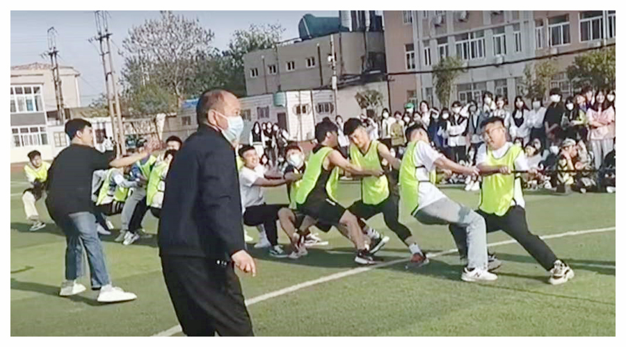 我校举办第九届春季运动会拔河比赛 我校举办第九届春季运动会拔河比赛